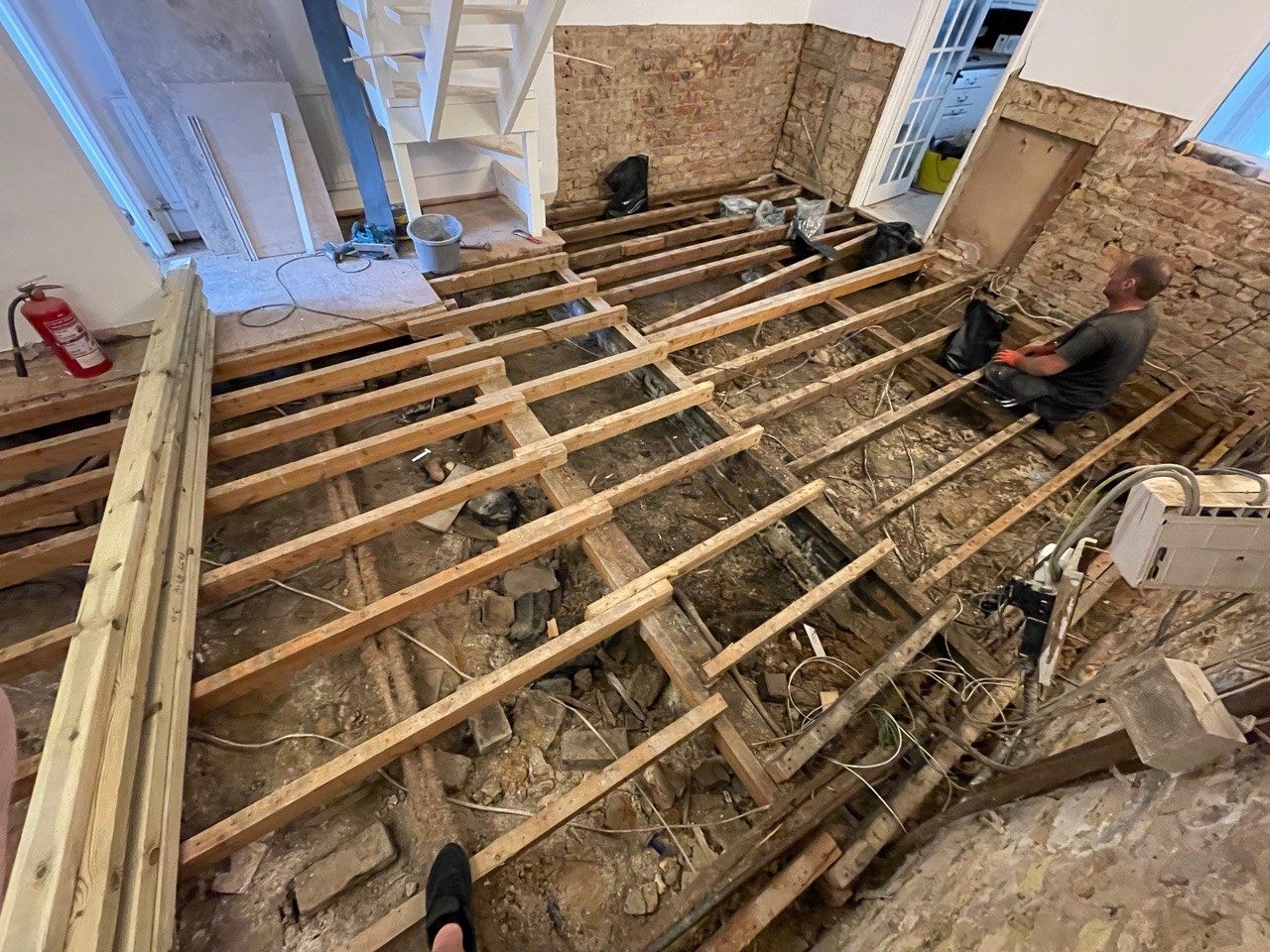 New floor joists fitted during a restoration