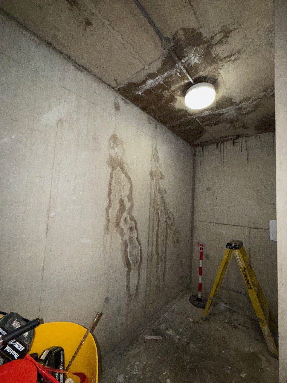Water staining coming through a basement wall