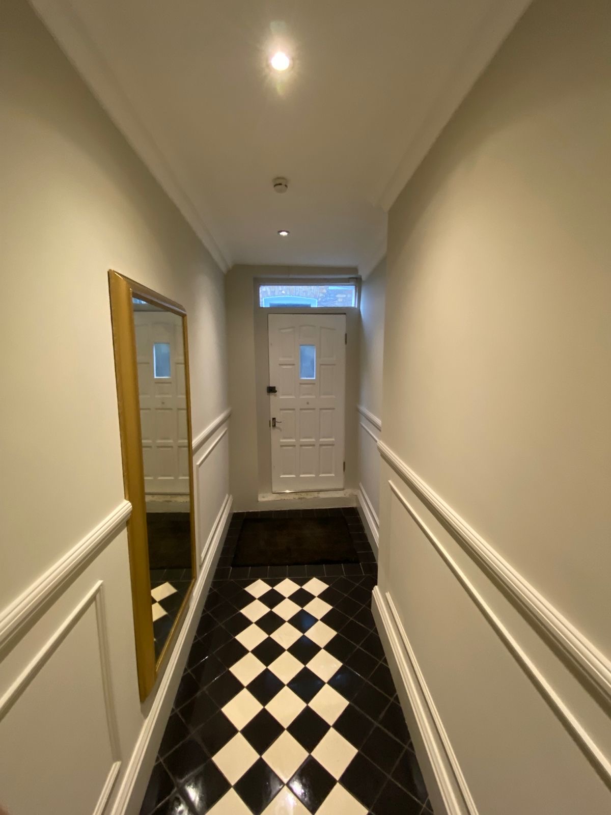 Finished hallway towards the front door