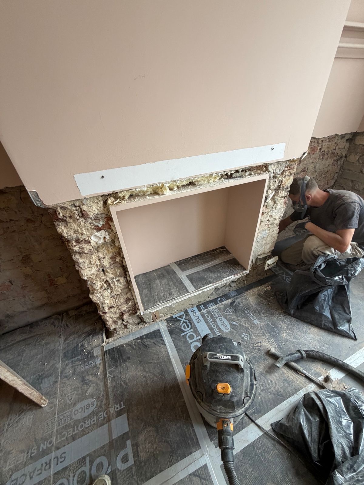 Works in progress on the chimney breast