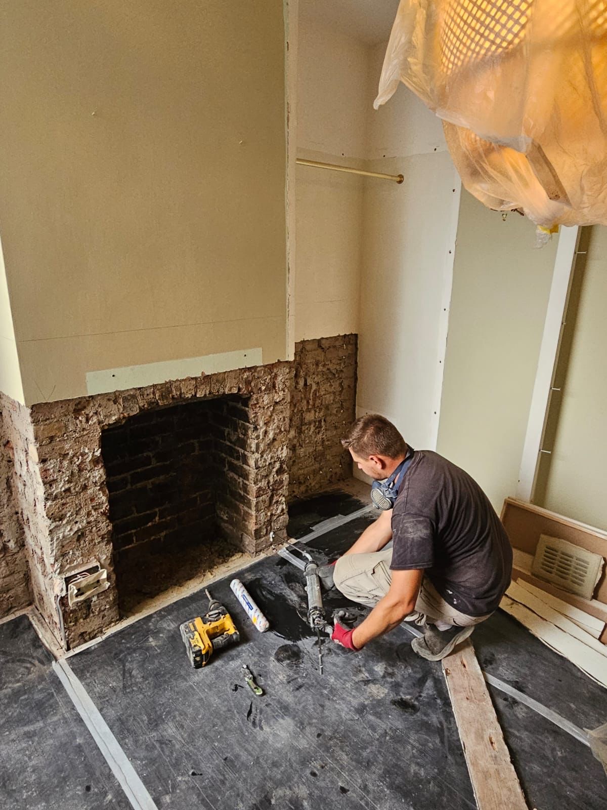 Repairing the wall around a fireplace