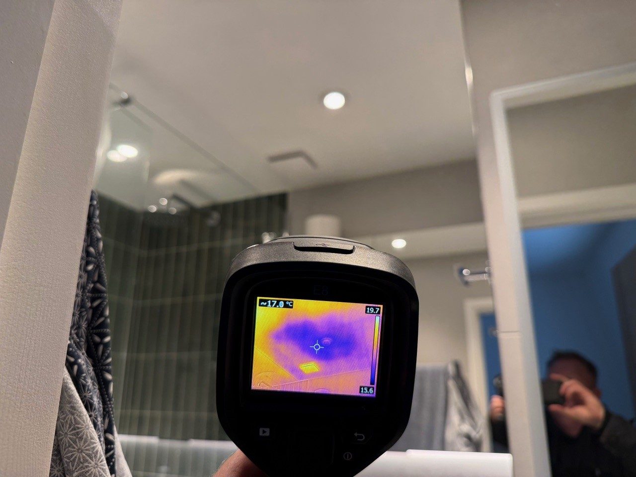 Thermal camera checking a bathroom for a hidden leak